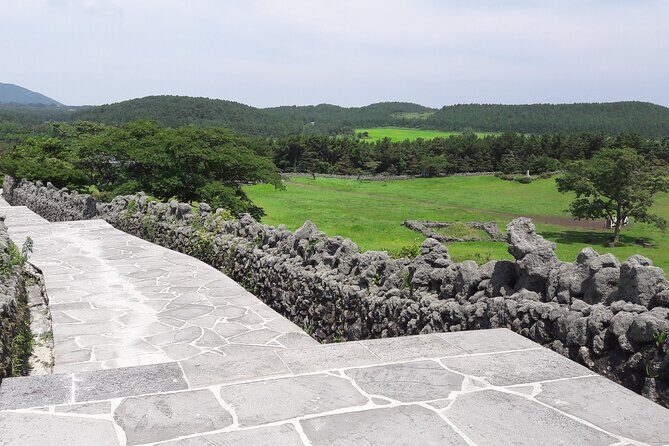 Beautiful Jeju Island Private UNESCO day Tour - Woljeongri Beach: white sand, emerald water, and quick café time