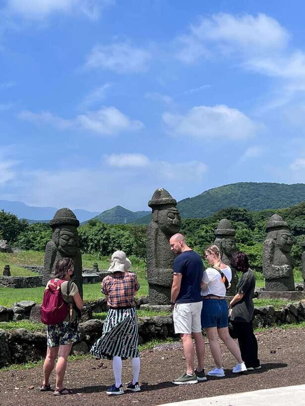 Jeju Island: Van Tour with a Guide Who Most Loves Jeju - Seopjikoji short trail: a cliff walk with K-drama energy