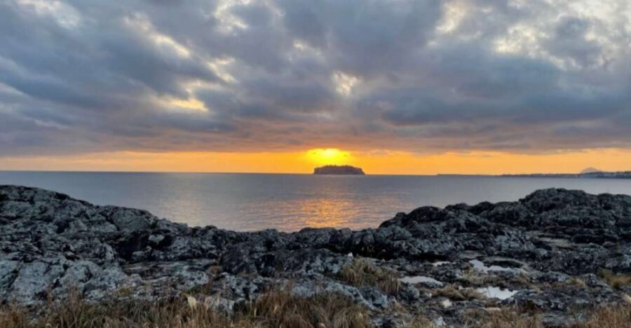 Jeju: Seogwipo City Walking Tours with Sunset - Stop 2: Saeyeongyo Bridge at Sunset Over Port and Sae Island