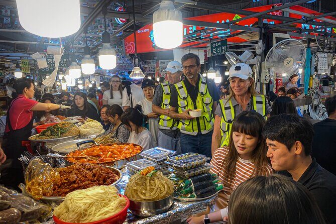 Market Food Tour & Evening E-bike Ride in Seoul - Cheonggyecheon stream and the palaces: quick stops with real context