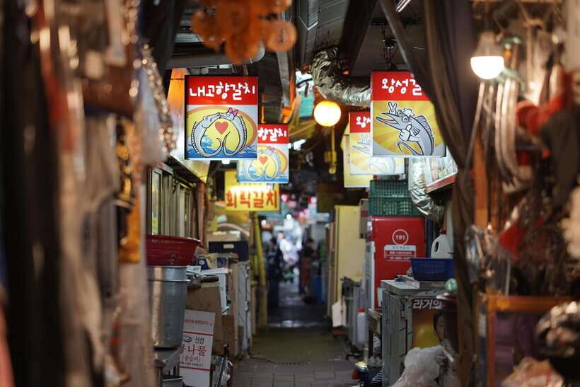 Seoul: Guided Street Food Tour at Namdaemun Market - Logistics you should plan for: walking, bags, and rain