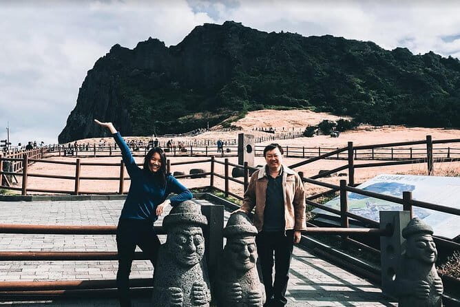 Small Group Tour East Jeju Cherry Blossom & Woman Diver Show - Jeonnonglo Beojkkochgeoli: King Cherry Blossoms and Festival-Style Vibes